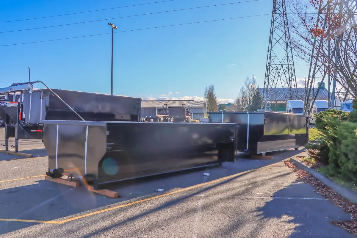 Roll-off dumpster ready for waste disposal at job site for 2 Yard Dumpster Rental in Richland